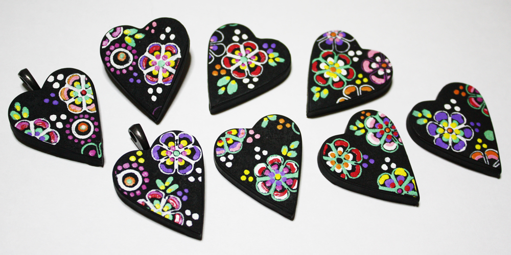 Fabric painting applied onto heart bases